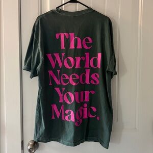 Dressed in Lala green and pink world needs your magic tee size s/m